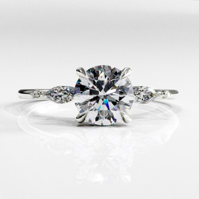 Round Cut Moissanite Side Stone Engagement Ring