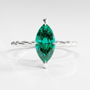 Marquise Cut Lab Grown Emerald Hidden Halo Twisted Engagement Ring