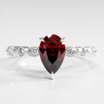 Pear Cut Lab Grown Ruby Hidden Halo Side Stone Engagement Ring