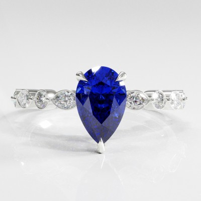 Pear Cut Lab Grown Sapphire Hidden Halo Side Stone Engagement Ring