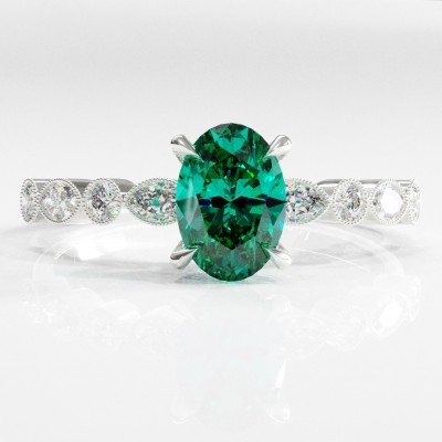 Oval Cut Lab Grown Emerald Hidden Halo Side Stone Engagement Ring