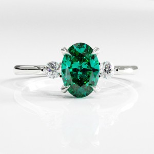 Oval Cut Lab Grown Emerald Three Stone Engagement Ring