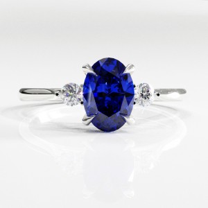 Oval Cut Lab Grown Sapphire Three Stone Engagement Ring