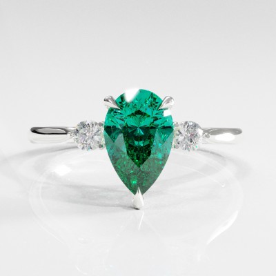 Pear Cut Lab Grown Emerald Three Stone Engagement Ring