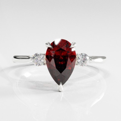 Pear Cut Lab Grown Ruby Three Stone Engagement Ring