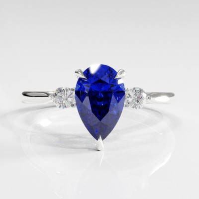 Pear Cut Lab Grown Sapphire Three Stone Engagement Ring