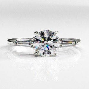 Round Cut Moissanite Three Stone Engagement Ring