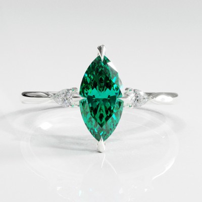 Marquise Cut Lab Grown Emerald Three Stone Engagement Ring