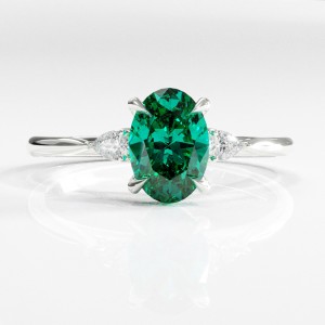 Oval Cut Lab Grown Emerald Three Stone Engagement Ring