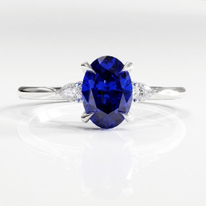 Oval Cut Lab Grown Sapphire Three Stone Engagement Ring