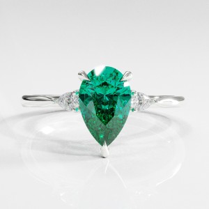 Pear Cut Lab Grown Emerald Three Stone Engagement Ring