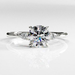 Round Cut Moissanite Three Stone Engagement Ring