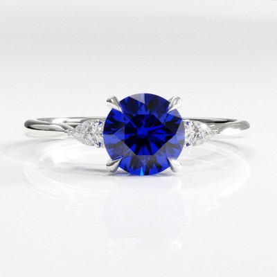 Round Cut Lab Grown Sapphire Three Stone Engagement Ring