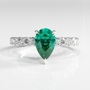 Pear Cut Lab Grown Emerald Hidden Halo Side Stone Engagement Ring