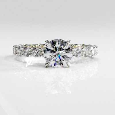 Round Cut Moissanite Hidden Halo Side Stone Engagement Ring